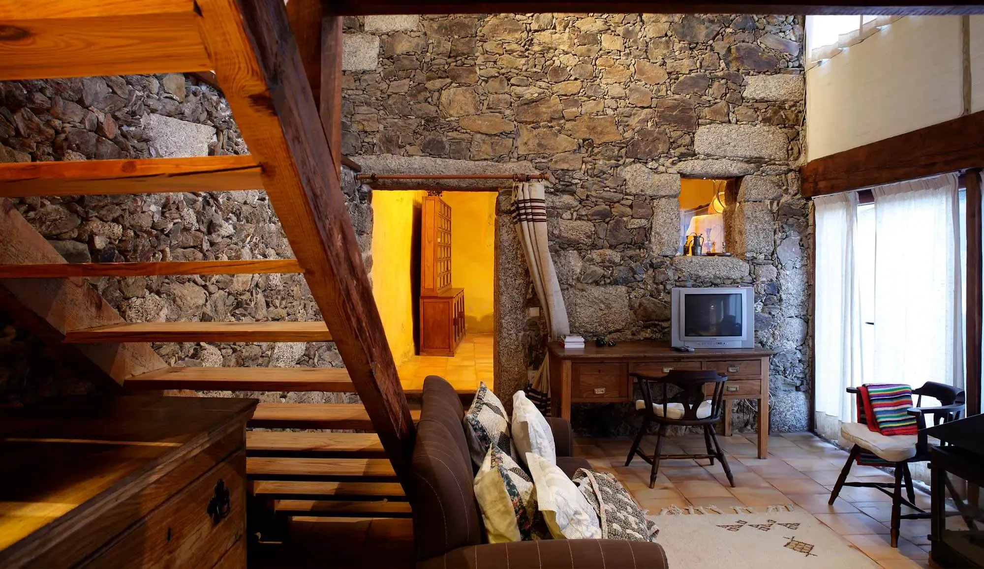 Casa de Cocenda lounge with fireplace